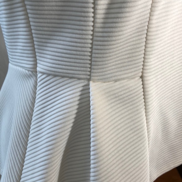 Striking Architectural Peplum Top - Picture 8 of 10